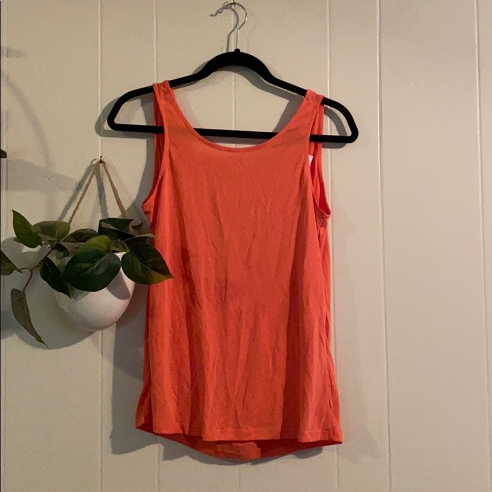 Coral colored Naked Zebra open back tank